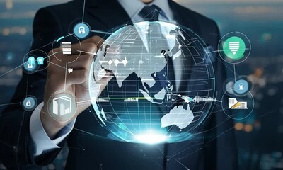 Businessman holding digital globe with global network and internet technology icons and big data connections on dark background - Powered by Adobe