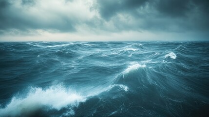 Fototapeta premium A stormy sea with large, choppy waves, captured during a dramatic ocean weather event.