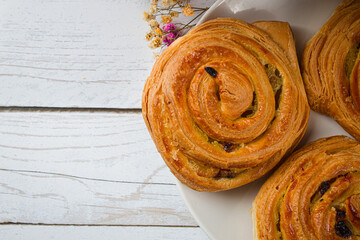 Plate with homemade baked goods on a light background