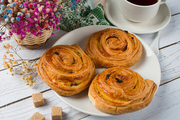 Plate with homemade baked goods on a light background