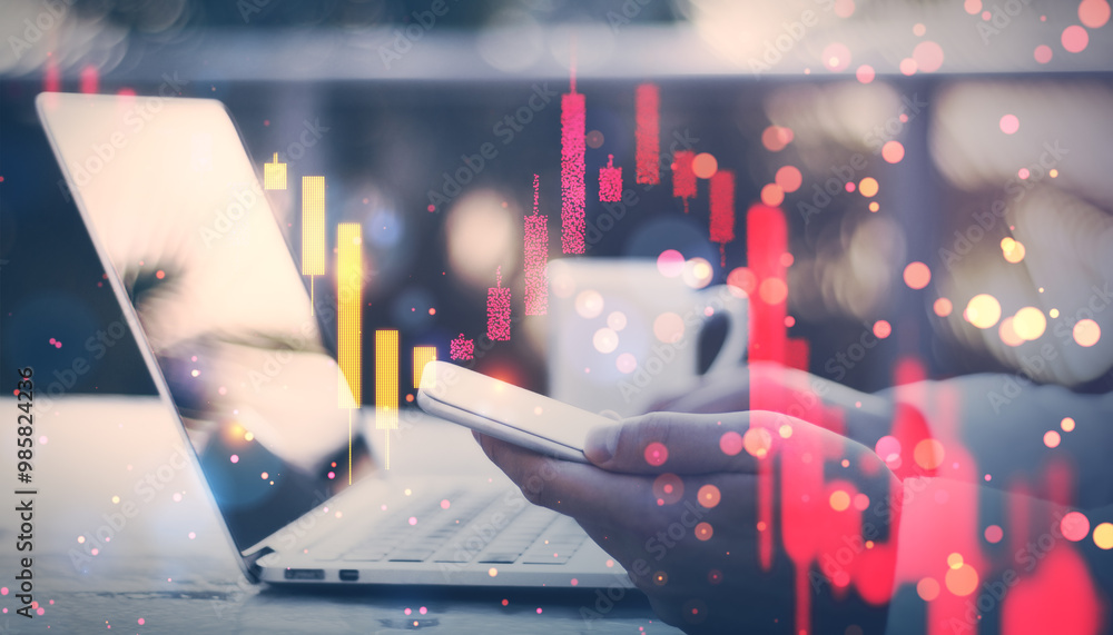 Poster Double exposure image of a person using smartphone with financial graphs overlayed on a blurry background.