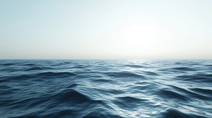 Obraz premium A wide shot of a calm ocean, with gentle waves rolling towards a distant horizon.