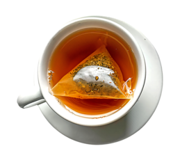 Tea steeping in a white cup with a pyramid tea bag