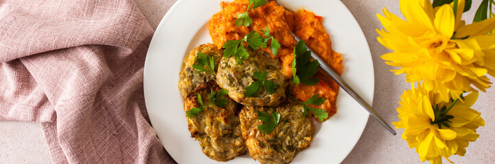 Start your morning with a healthy, savory meal of zucchini pancakes paired with vibrant tomato and bell pepper caviar, packed with fresh vegetables and nutrients, banner