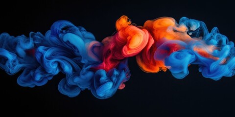Obraz premium Colorful swirling smoke on a dark background.