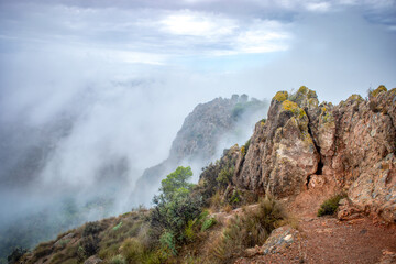View from Cresta del Gallo in El Valle Regional Park in Murcia, Region of Murcia, Spain with clouds after rain
