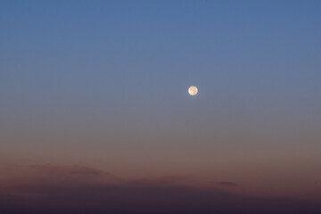 Moon in the sky at twilight time