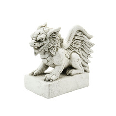 Fototapeta premium Stone Sculpture of a Chinese Guardian Lion with Wings