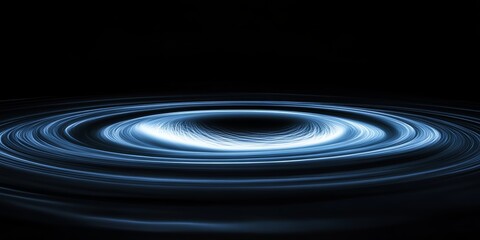 A mesmerizing blue light pattern creates a vortex effect against a dark background, evoking a sense of depth and motion