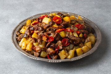From Turkish cuisine; meat, vegetable kebab, casserole. Turkish name; Maras Tava or Kahramanmaras Tava - Orman Kebabi