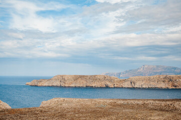Naklejka premium Beautiful Mediterranean summer landscape, bird's eye view. Mountains and rocks, turquoise water in the bay. Gramvousa island, Crete, Greece.