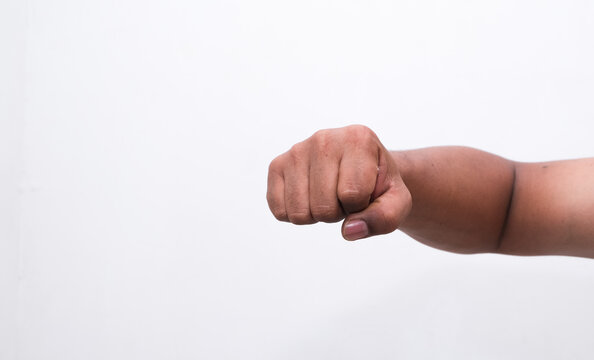 portrait of man's hand clenching fist isolated white background