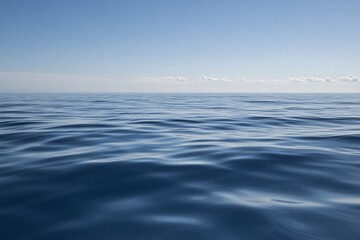 Obraz premium Calm Ocean Water Under a Clear Sky