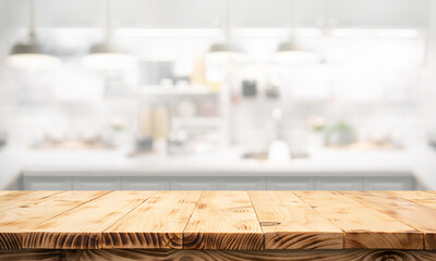 beautiful wood texture wood counter table top on blur white minimal kitchen background.For montage product display
