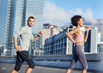 Running, street and training with couple in city for start of fitness, athlete and wellness. Race, exercise and marathon workout with people for urban, health and sports performance together