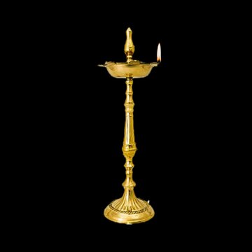 Indian traditional samai or samayee diya or deepam brass lamp burning with transparency - Loop Video for motion graphics