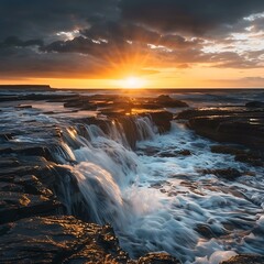 Obraz premium Sunrise over the Ocean with Waterfall