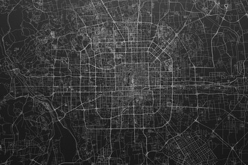 Street map of Beijing (China) on black paper with light coming from top