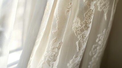 Obraz premium A close-up of sheer curtains with delicate embroidery, adding an elegant and feminine touch to the room.