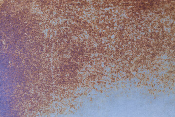 Old gray iron board, corroded and rusty. Close-up, blurry or blurry.