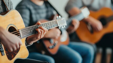 Obraz premium A group of friends jamming together with guitars in a casual setting