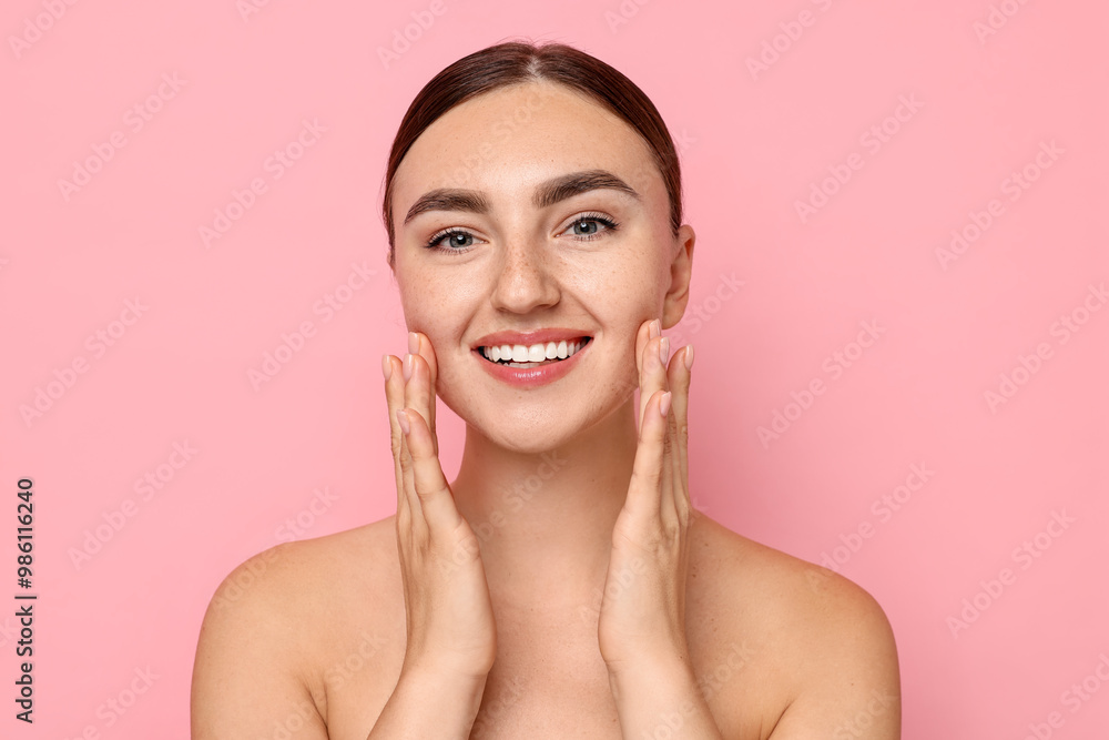 Sticker Face massage. Beautiful young woman with healthy skin on pink background