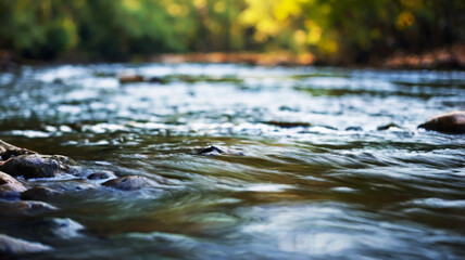 Fototapeta premium Blurred bokeh of a calm, flowing river