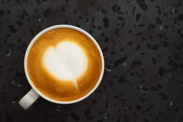 topv view of cappuccino on terrazzo surface with copy space