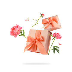 Gift boxes and peony flowers in air on white background