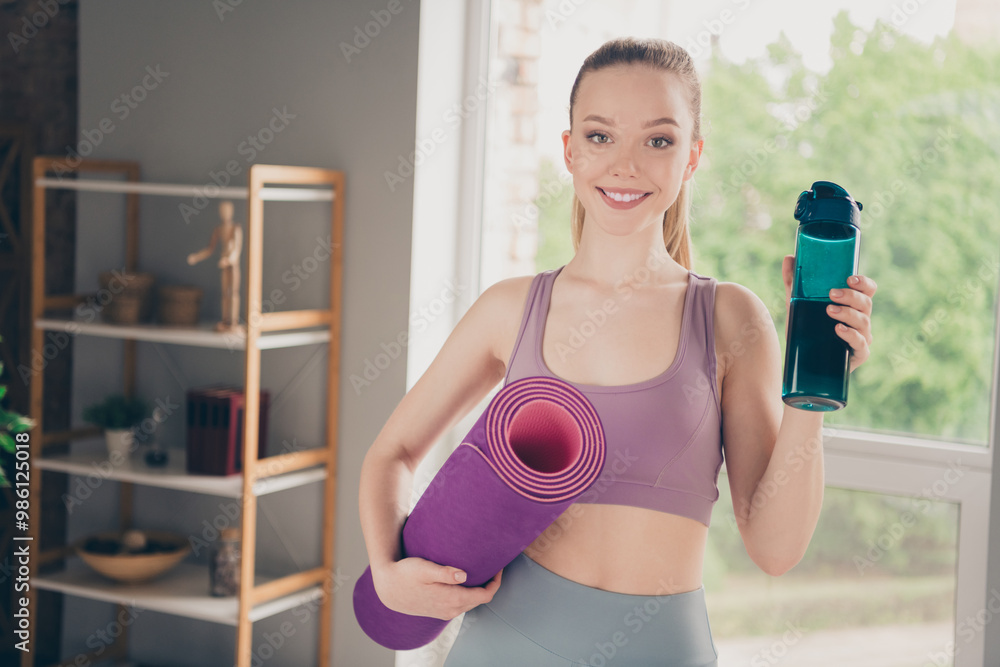 Sticker Photo of lovely adorable sporty active girl training physical exercises house indoors