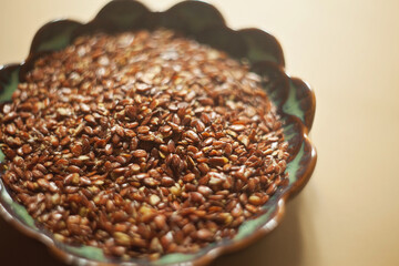 Healthy seeds - closeup of flax seed in a bowl, for follicular phase of menstrual cycle