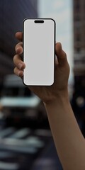 Caucasian White male using smartphone with a blank white screen. City, street, pedestrians apps mockup. Vertical phone orientation