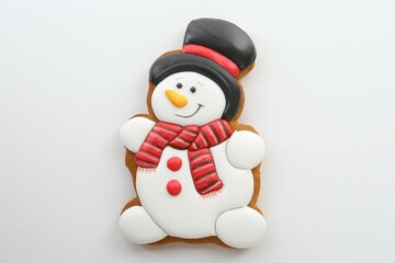 Tasty Christmas cookie in shape of snowman isolated on white