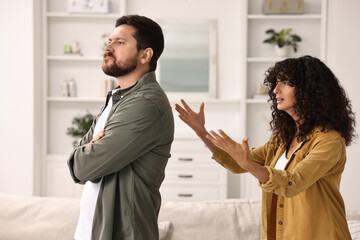 Emotional couple having quarrel at home. Relationship problems