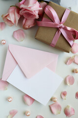 greeting card. rose bouquet and gift box with bow