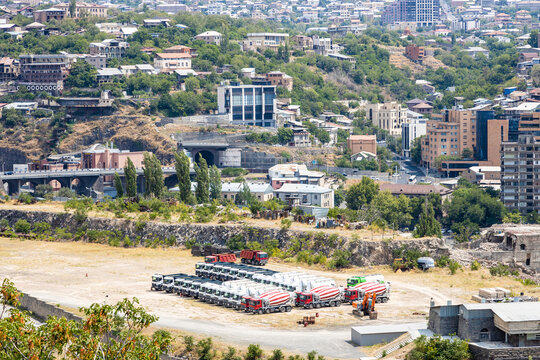 Yerevan, Armenia - August 11, 2024: above view of vehicle parking area and Nor Nork district in Yerevan city Armenia from Victory Park on sunny summer day