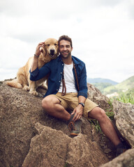 Man, happy and dog in nature for travel, hiking and holiday with bonding, connection and portrait....