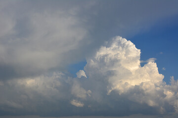 a stormy and rainy cloud that is in the sky