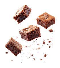 Brownies falling through the air with crumbs and chocolate chips scattered around