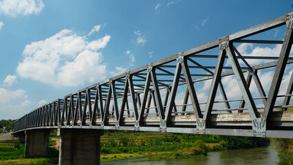 Obraz premium steel bridge over the river