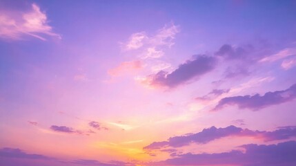 Fototapeta premium Beautiful dusk sky with a fading orange glow blending into purple and blue