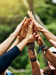 High five, hands and group of people outdoor with collaboration, motivation and solidarity for...