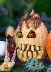 Unusual original Halloween composition, scary Jack O Lantern Halloween pumpkins in the dark