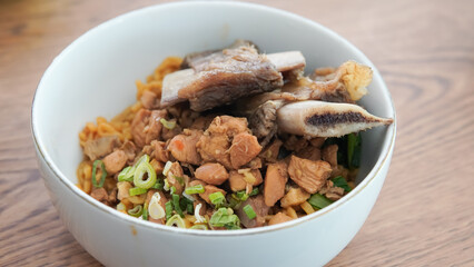 Short rib noodle in a white bowl