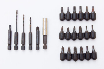 A collection of drill bit sets. Some are large and some are small, each has its own function and corresponds to the shape of the screw.