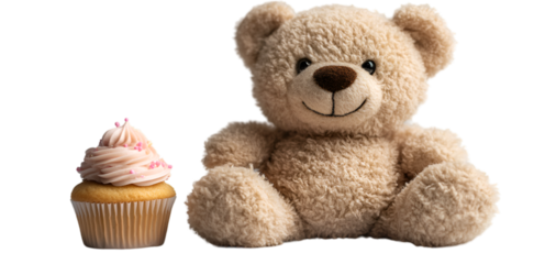 a stuffed bear next to a cupcake.