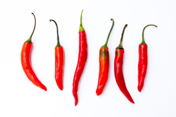 A picture of red chilies. Red chilies are high in vitamin C and beta-carotene, making them good for the skin. 
