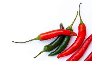 A picture of green chilies and red chilies. Green chilies are high in vitamin C and beta-carotene, making them good for the skin. 