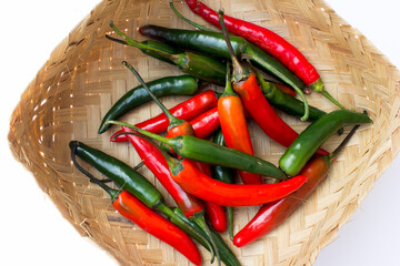 A picture of green chilies and red chilies. Green chilies are high in vitamin C and beta-carotene, making them good for the skin. 