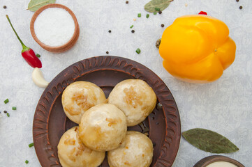 beautifull ukranian food on the traditional table with green, salt, pepper, spices 